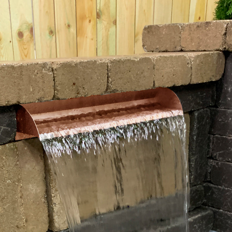 24" Copper Finish Spillway with Liner In Use