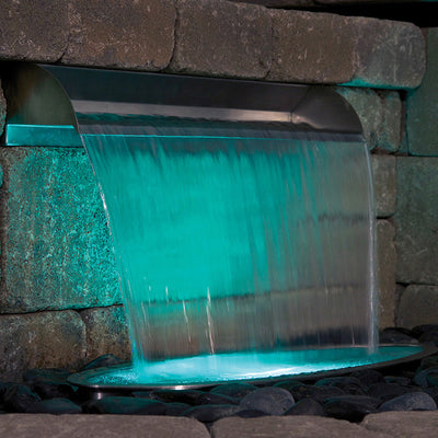 24" Stainless Steel Spillway in Use at night