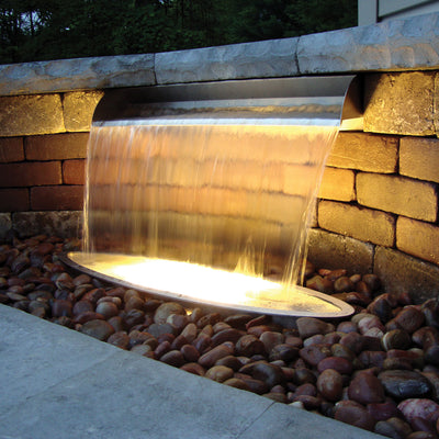 36" Stainless Steel Spillway In use at night