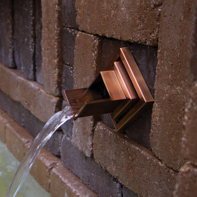 Copper-Finish Verona Wall Spout In use up close