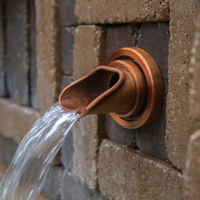 Copper-Finish Olivett Wall Spout In use up close