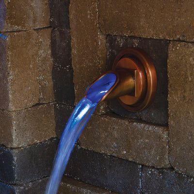 Copper-Finish Ravenna Wall Spout In use up close at night